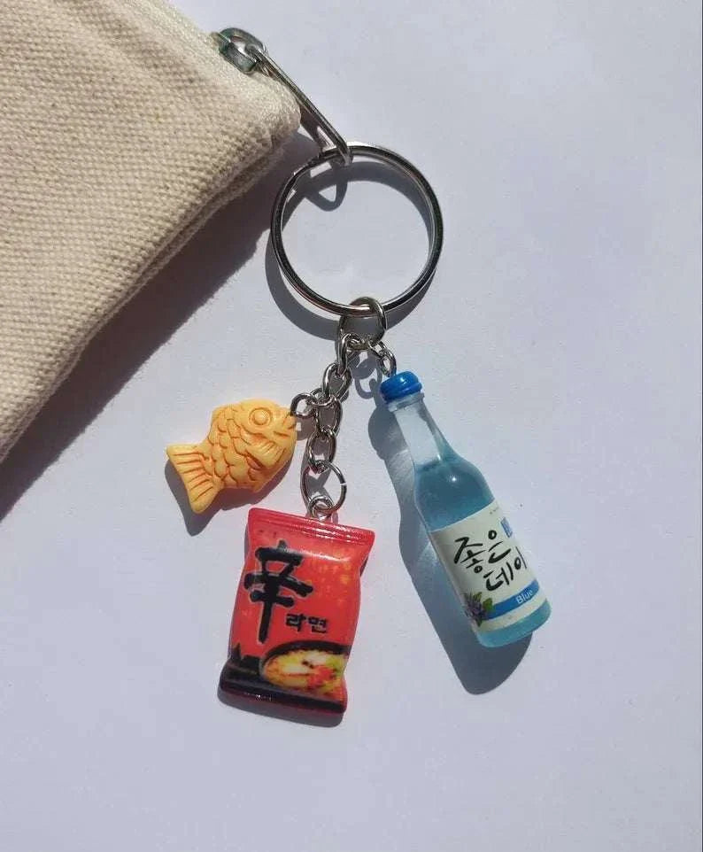 Korean inspired keychain with bungeo-ppang, ramen, and soju charms.