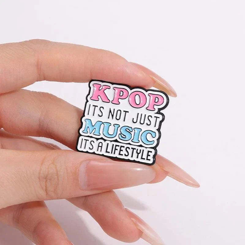 K-pop enamel pin with "KPOP it's not just music, it's a lifestyle" text.